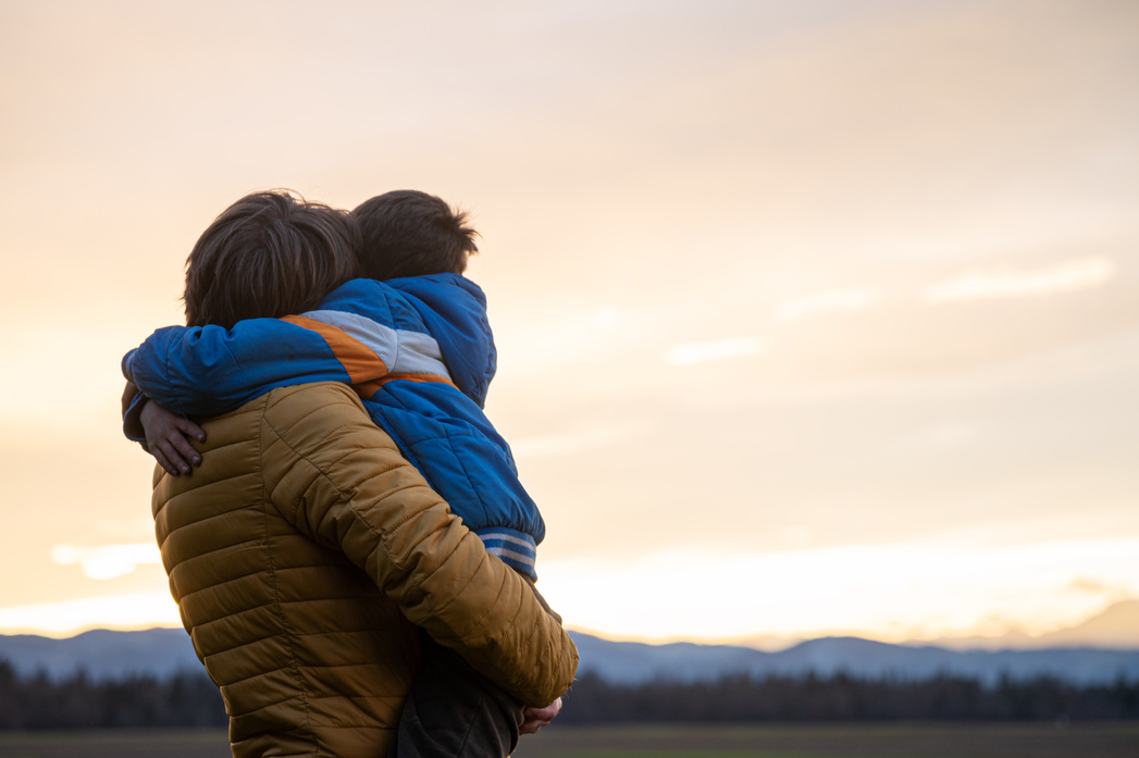 Father and Son Hugging Each Other