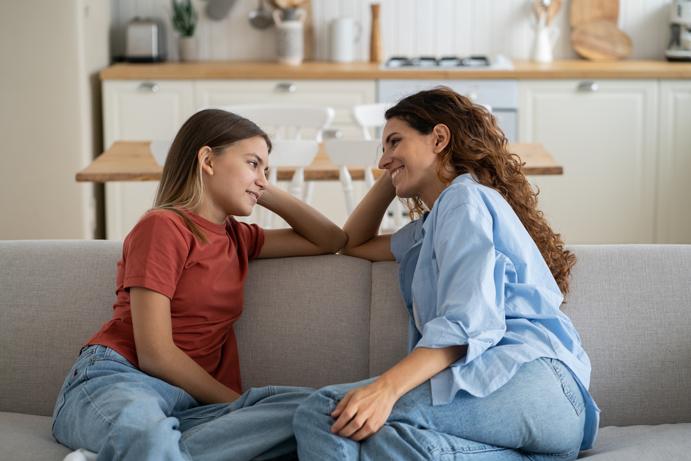 Loving Mother Listening to Daughter with Empathy and Understanding, Child Sharing Secrets with Mom